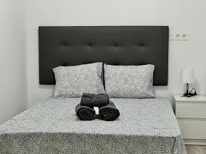 Posteľ alebo postele v izbe v ubytovaní Los Tilos Suites-Vialia