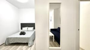 Posteľ alebo postele v izbe v ubytovaní Los Tilos Suites-Vialia