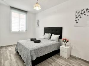 Posteľ alebo postele v izbe v ubytovaní Los Tilos Suites-Vialia
