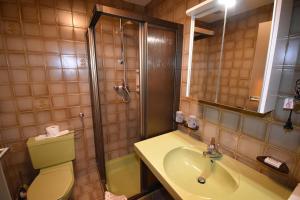 Koupelna v ubytování Hotel Martina