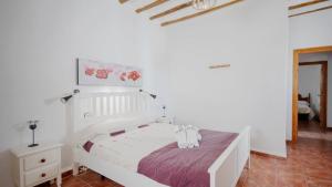 Posteľ alebo postele v izbe v ubytovaní Cortijo El Álamo 1 Vélez Blanco by Ruralidays