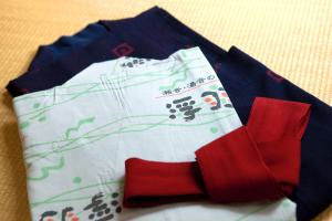 a close up of apron with red napkins on a table at Ukiha in Hita