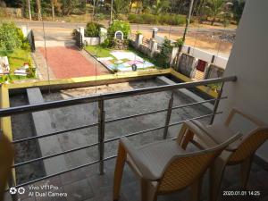 Balcone o terrazza di His Grace Holiday Home - Nr to Malpe Beach