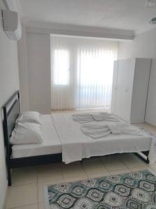 Postel nebo postele na pokoji v ubytování Hayati Çelikoğlu - SteelGate