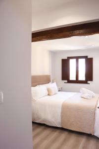 Postel nebo postele na pokoji v ubytování LAGO Home - Apartamento nuevo en Llanes centro