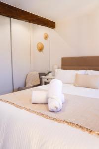 Postel nebo postele na pokoji v ubytování LAGO Home - Apartamento nuevo en Llanes centro