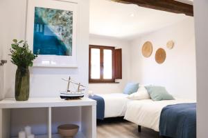 Postel nebo postele na pokoji v ubytování LAGO Home - Apartamento nuevo en Llanes centro