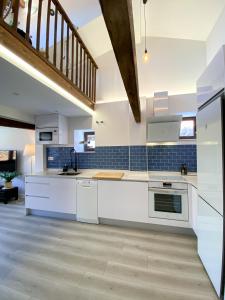 Kuchyň nebo kuchyňský kout v ubytování LAGO Home - Apartamento nuevo en Llanes centro