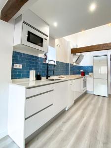 Kuchyň nebo kuchyňský kout v ubytování LAGO Home - Apartamento nuevo en Llanes centro