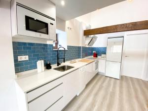 Kuchyň nebo kuchyňský kout v ubytování LAGO Home - Apartamento nuevo en Llanes centro