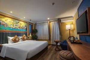 TV a/nebo společenská místnost v ubytování HOTEL DE SAPA
