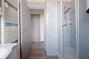 a bathroom with a shower and a sink at B&B Elegance in Bologna