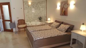 Posteľ alebo postele v izbe v ubytovaní ANFI TOPAZ VILLA TAURO GOLF & BEACH 3 bedrooms 4 bathrooms private pool + 37 fotografií
