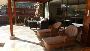 Posedenie v ubytovaní ANFI TOPAZ VILLA TAURO GOLF & BEACH 3 bedrooms 4 bathrooms private pool