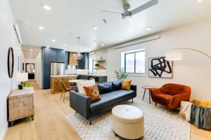 a living room with a couch and a kitchen at The Lofts on 89 Condo - 5 Miles to Salt River! in Afton +18 photos
