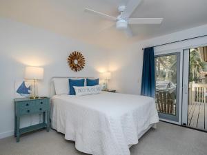 Postel nebo postele na pokoji v ubytování 1129 Summerwind Cottage