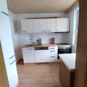 Kuchyň nebo kuchyňský kout v ubytování Ferienwohnung Patrycja