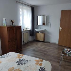 Postel nebo postele na pokoji v ubytování Ferienwohnung Patrycja