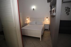 Postel nebo postele na pokoji v ubytování Raggio di Luna
