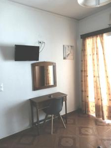 TV a/nebo společenská místnost v ubytování P&G APARTMENTS