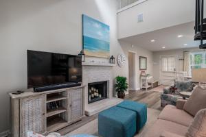 TV a/nebo společenská místnost v ubytování 532 Tarpon Pond Cottage