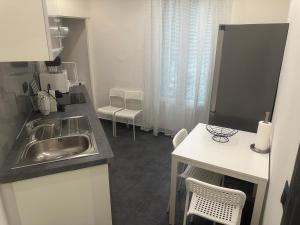 Kuchyň nebo kuchyňský kout v ubytování Le cœur de Marseille