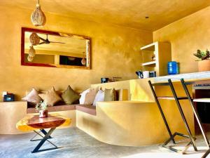 Et opholdsområde på Casa Maloya alberca y vista al mar