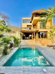 Swimmingpoolen hos eller tæt på Casa Maloya alberca y vista al mar