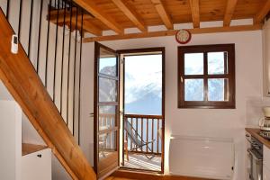 Nespecifikovaný výhled na hory nebo výhled na hory při pohledu z apartmánu + 7 fotografií