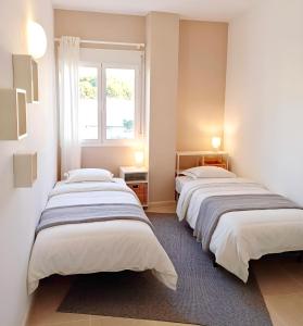 Posteľ alebo postele v izbe v ubytovaní Sunny Penthouse Calpe