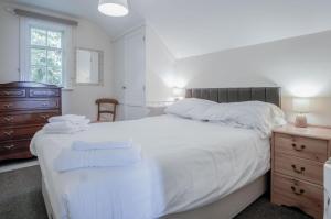 Postel nebo postele na pokoji v ubytování The Gatehouse - 2 Bedroom Apartment - Pendine