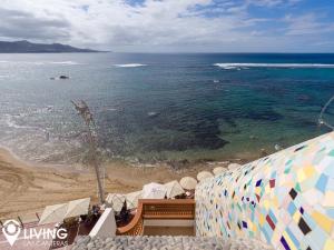 a view of the beach and the ocean at Living Las Canteras Homes - BEACHFRONT IN STYLE in Las Palmas de Gran Canaria