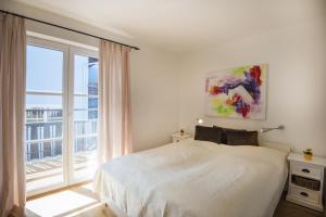 Postel nebo postele na pokoji v ubytování Haus Wasmer by AlpenTravel
