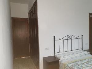Postel nebo postele na pokoji v ubytování Villa el Mirador