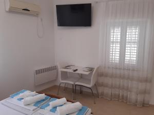 Studio apartman TEDY客房内的一张或多张床位