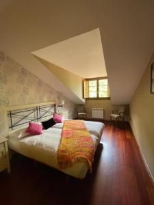 Postel nebo postele na pokoji v ubytování Apartamentos Casa Miño