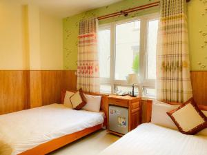 Fotografie z fotogalerie ubytování NGỌC BẢO CHÂU HOTEL v destinaci Da Lat