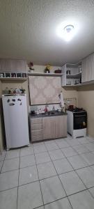A kitchen or kitchenette at Residencial Viver Ananindeua