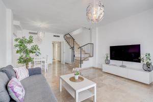 TV a/nebo společenská místnost v ubytování Casa del Sol