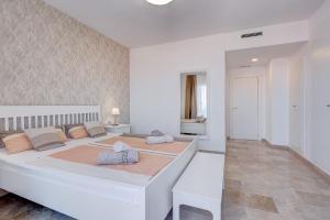 Postel nebo postele na pokoji v ubytování Casa del Sol
