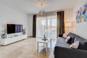 TV a/nebo společenská místnost v ubytování Casa del Sol