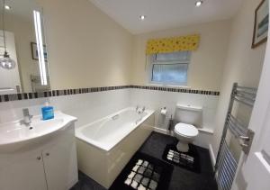 Et badeværelse på Gerddi'r Coed