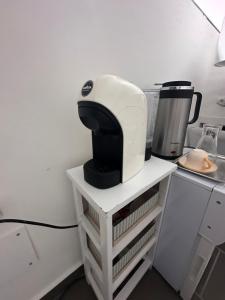 A kitchen or kitchenette at Holiday apartament