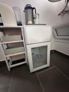 A kitchen or kitchenette at Holiday apartament