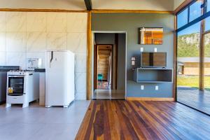 Photo de la galerie de l'établissement Villa Taipas - Chalé Ariê, à Cavalcante 27 autres photos