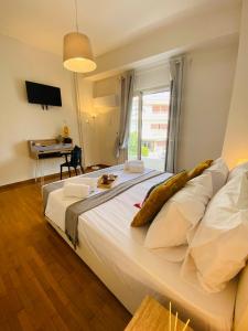 2 BD Apt in Koukaki 8’ away from Acropolis客房内的一张或多张床位