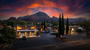 a view of a building with a mountain in the background at Dreamcatcher Inn of Sedona in Sedona