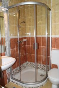 Koupelna v ubytování Mandarin Wellness Apartman