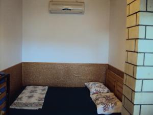 Postel nebo postele na pokoji v ubytování Druzhba 598