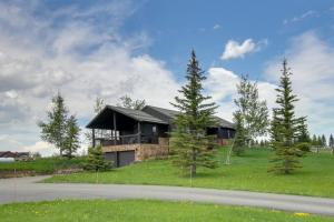 a house on the side of a road at Stunning Gallatin Gateway Mountain Retreat! in Gallatin Gateway